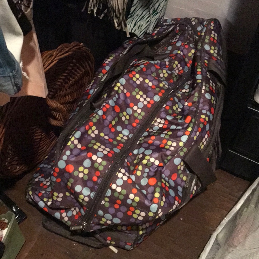 Lesportsac extra large rolling duffle suitcase